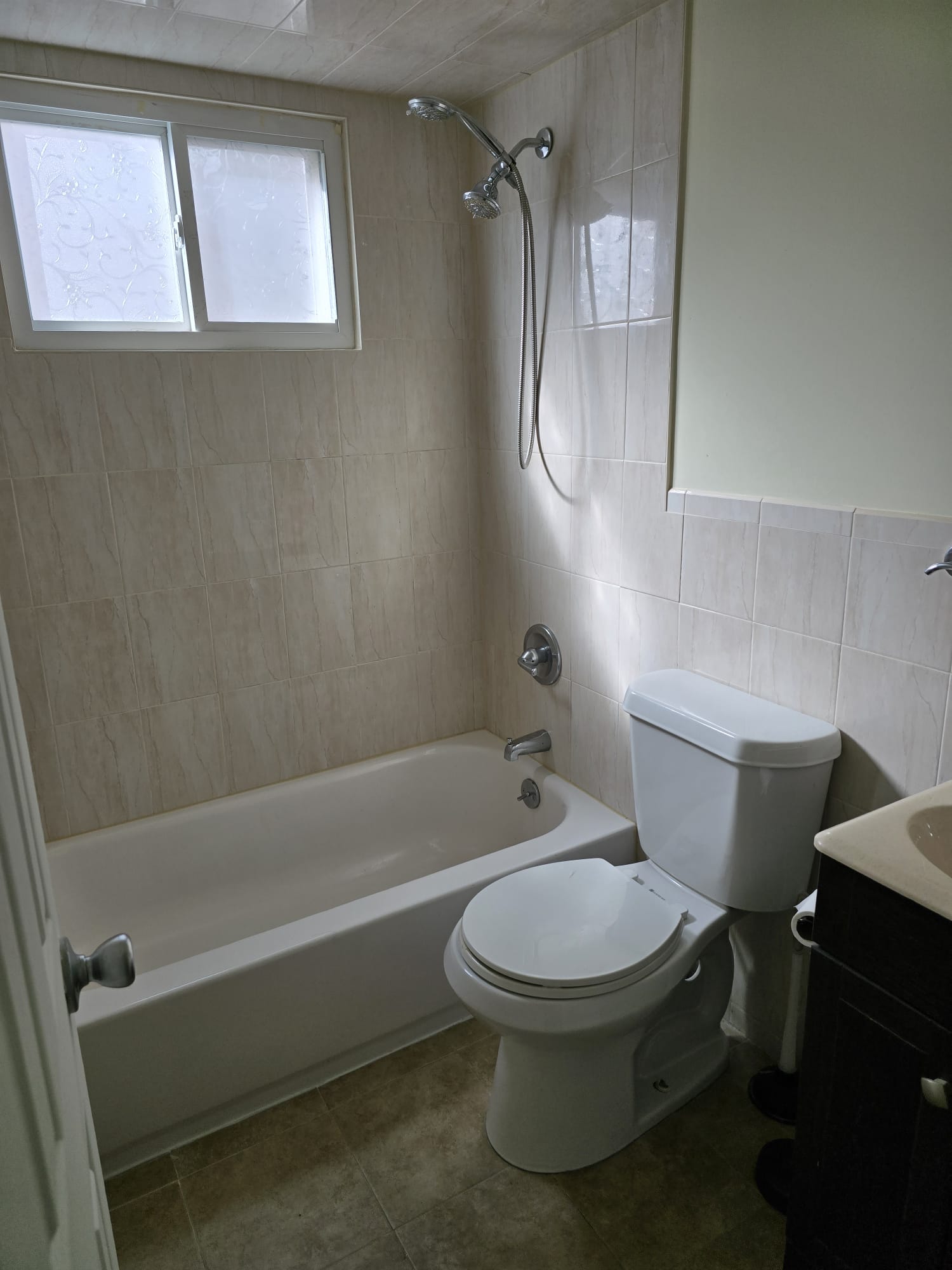 Staten Island 1BR — full bathroom with tub and shower