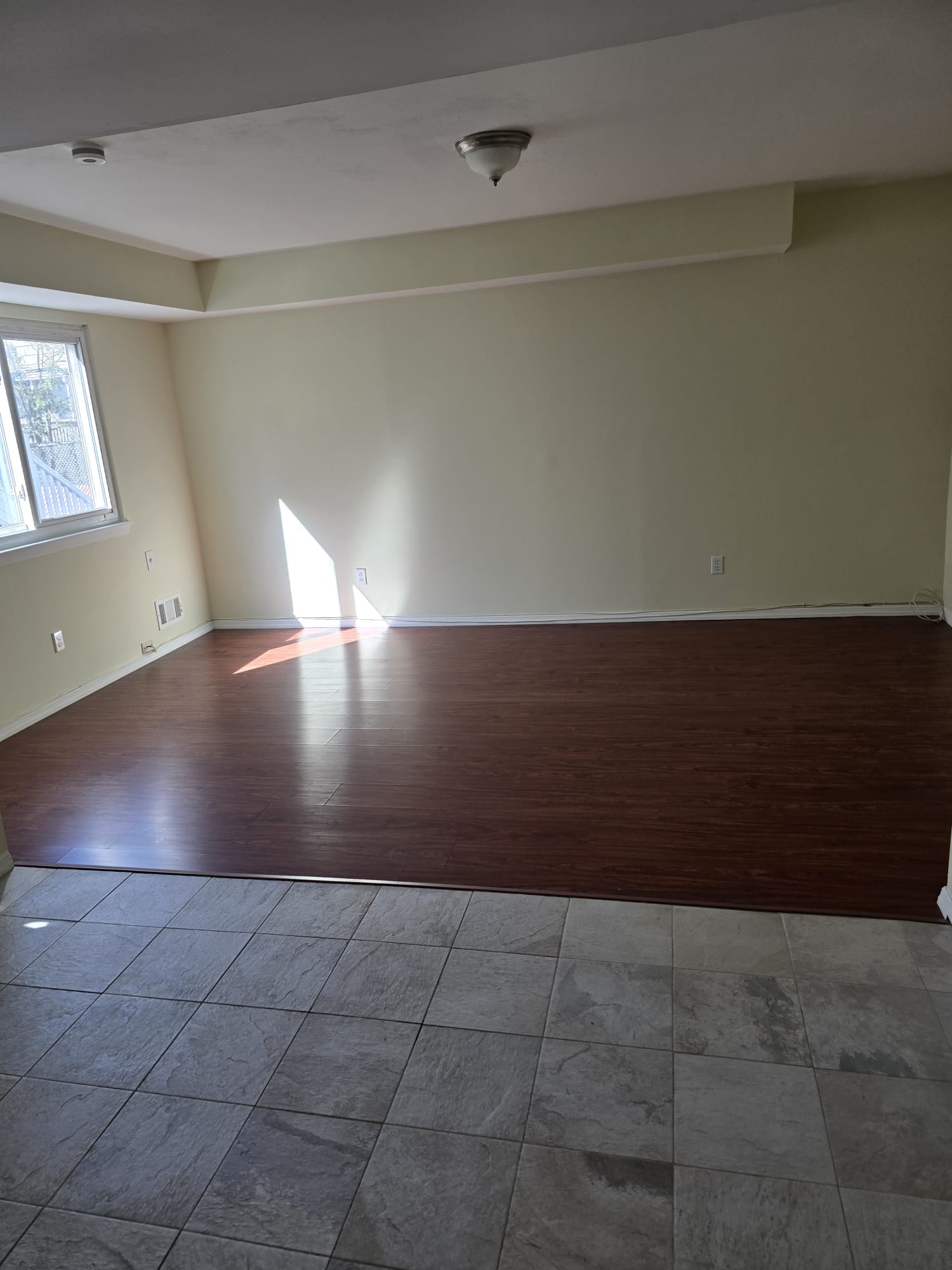 Staten Island 1BR — living and dining area with wood floors