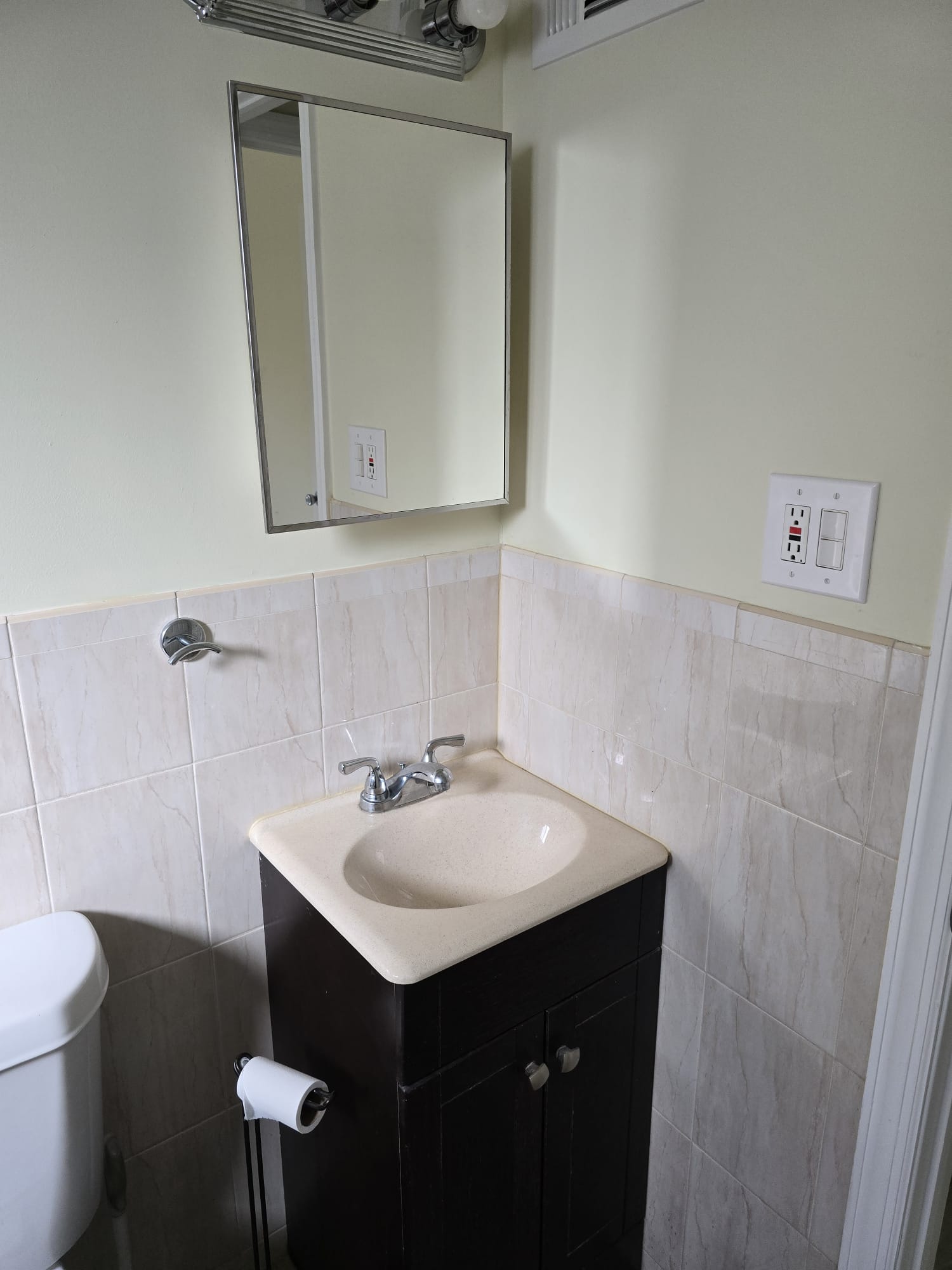 Staten Island 1BR — vanity and mirror